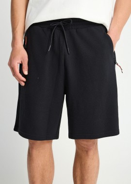 Relaxed fit αθλητική βερμούδα σε πικέ ύφανση