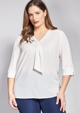 - Μπλούζα ζωρζέτα με γραβάτα και τρουακάρ μανίκια.